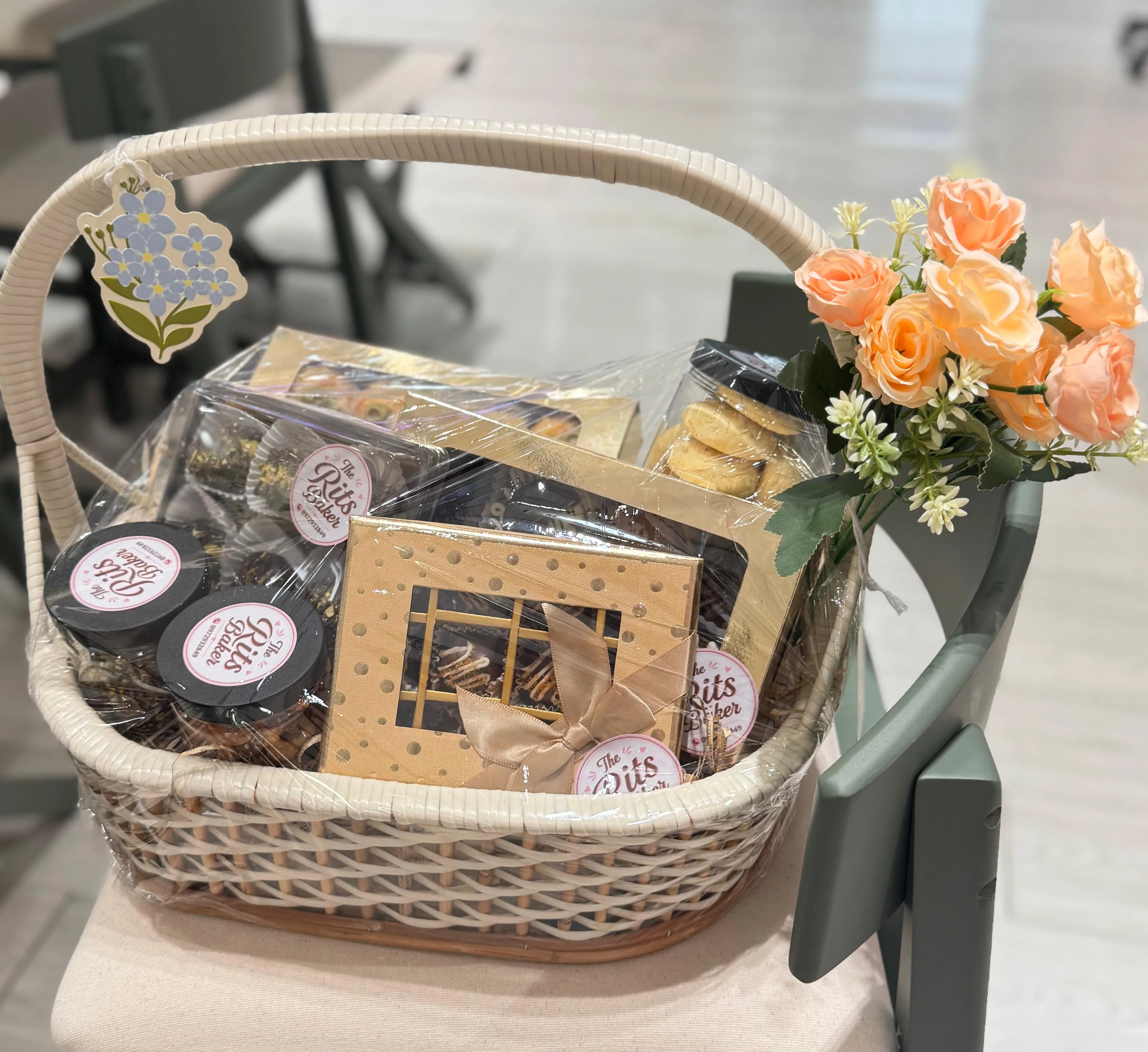 Baked goods arrangement with fresh flowers